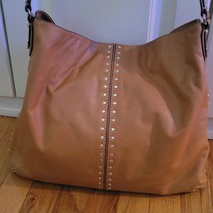 Micheal Kors studded leather hobo bag.